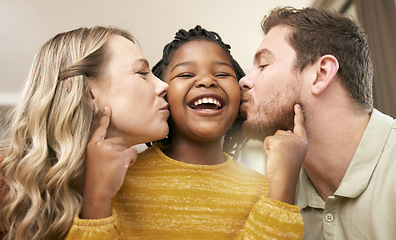 Image showing Love, foster and parents kiss daughter for adopted relationship bonding in loving, caring home. Adoption, interracial and mother and father with cheerful little girl being kissed in house