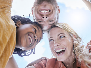 Image showing Happy, smile and interracial family hug of mother, father and girl faces outdoor with love and care. Happiness, laughing and summer fun huddle of a mom, dad and kid with below blue sky view