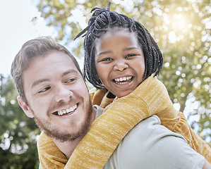 Image showing Park, piggyback and father with girl kid in nature playing, bonding and exploring with bokeh. Happy, smile and portrait of an interracial child with her dad in an outdoor green garden or field.