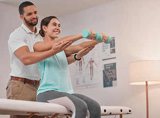 Image showing Physical therapy, dumbbell and physiotherapist helping woman for muscle, fitness and body healthcare rehabilitation. Physiotherapy, patient and chiropractor support with stretching for sports injury