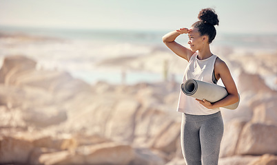 Image showing Fitness exercise, yoga mat and black woman at beach preparing for workout outdoors with mockup. Zen, mindfulness meditation and happy female from South Africa ready for pilates training at seashore.