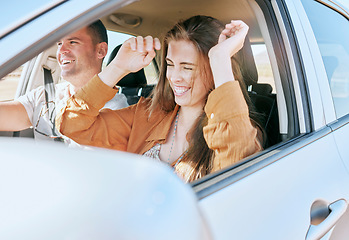 Image showing Couple, road trip and smile in car together in traffic for drive, transport or driving adventure. Man, woman and happy on road, street or journey with happiness on travel, holiday or vacation in sun