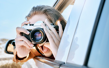 Image showing Camera, car and road trip of a woman excited about holiday, adventure and motor travel transport. Photography of a happy person in transportation ready for vehicle traveling and summer vacation