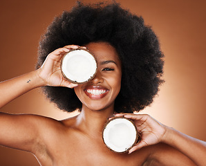 Image showing Coconut, studio and black woman natural face, skincare and hair promotion with mockup for healthy food or product marketing. African model portrait with facial cream coconut oil for health benefits