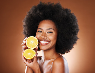 Image showing Skincare, beauty and portrait of model with lemon for wellness, organic facial treatment or natural vitamin c detox. Citrus fruit product, self care routine and face of black woman with glowing skin