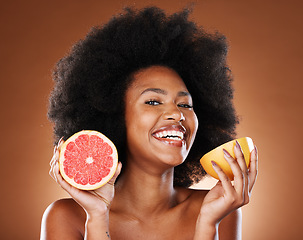 Image showing Skincare, beauty and portrait of black woman with grapefruit for vitamin c, skin glow or natural facial routine. Food product, self care and face of nutritionist model with organic detox treatment