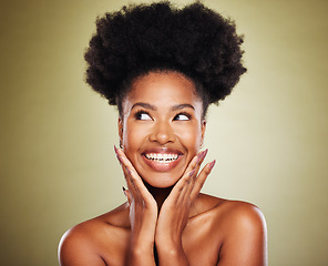 Image showing Black woman, afro hair or thinking of exciting ideas on green studio backgroud of healthcare wellness, self love or skincare. Smile, happy or inspired beauty model, natural hair or makeup cosmetics