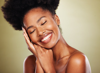 Image showing Black woman, hands and smile for facial skincare, makeup or cosmetics against a studio background. African American female smiling in satisfaction for beautiful cosmetic treatment or perfect skin