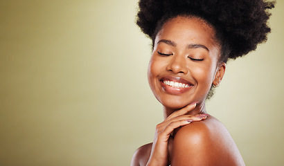 Image showing Beauty, skincare and black woman in a studio for a natural face routine with mockup space. Happy, smile and African model with a smile doing a facial treatment by a green background with copy space.