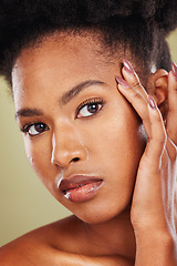 Image showing Closeup beauty, portrait and skincare black woman in studio with soft, radiant and glow on skin. African, model and natural makeup on face for cosmetics, wellness and health against green background