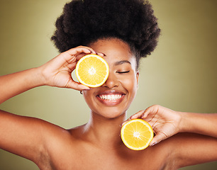 Image showing Skincare, wellness and black woman with lemon in studio for organic, natural and healthy skincare products. Beauty, cosmetics and girl with fruit advertising vitamin c, minerals and fresh spa facial