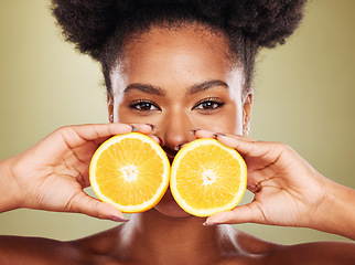 Image showing Lemon, skincare and studio black woman with natural beauty benefits, healthy food and vitamin c promotion, marketing or advertising. African model face portrait, lime fruits and dermatology cosmetics