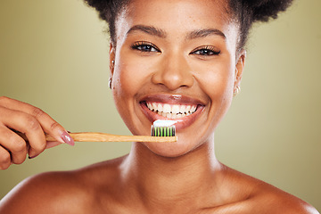 Image showing Brushing teeth, black woman beauty and dental wellness, healthy lifestyle and cleaning cosmetics on studio background. Happy african model face portrait, toothpaste on toothbrush and mouth smile