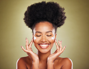 Image showing Cream, face and skincare black woman in studio for beauty, skin glow and shine for wellness goals, results and benefits advertising. Happy african model with sunscreen product for dermatology facial