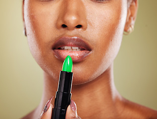 Image showing Black woman, lipstick and mouth makeup, cosmetics and zoom in of lips, skincare and beauty in studio background. Advertising, skin or female model with lip gloss, makeup cosmetic and color product