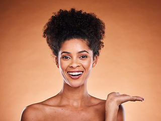 Image showing Black woman, skincare and advertising mockup in studio portrait with glow, shine and beauty wellness. Happy model face and hand for product placement mock up marketing, advertising or promotion space