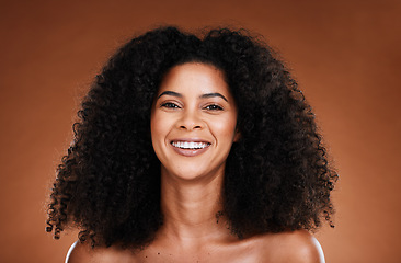 Image showing Natural, hair care and black woman in studio portrait for wellness, beauty and luxury with smile happy for shine or glow results. Skin care, healthy hair and young model headshot for salon promotion