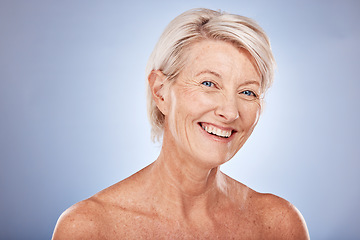 Image showing Portrait, skincare and antiaging with a mature woman in studio on a gray background for natural beauty care. Face, cosmetics and wellness with a senior female posing to promote a skin product