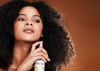 Image showing Black woman, afro and hairspray for hair treatment in studio on mockup background. Beauty, haircare or model from South Africa with curl pattern product or salon spray for hairstyle or texture