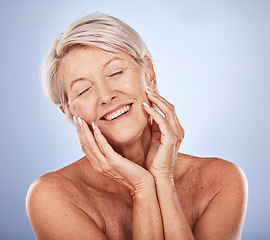 Image showing Beauty, elderly and model happy with face skincare for wellness, health and natural skin. Satisfied, smile and happiness of woman with gray studio mockup for facial cosmetic advertising.
