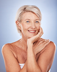 Image showing Beauty, skincare and portrait of mature woman with smile on face on blue background. Health, wellness and retirement, happy senior lady with skin care facial enjoying healthy lifestyle and body care.