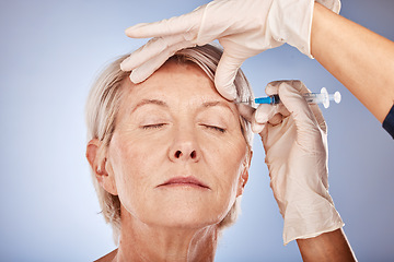 Image showing Skincare, mature woman and injection from healthcare professional for anti aging treatment for wrinkles on forehead. Beauty syringe, facial wellness and a senior lady getting collagen filler injected.