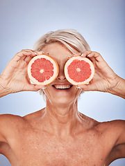Image showing Senior, fruit and health of a woman with grapefruit, healthy food and nutrition product. Wellness, skincare and natural skin care of elderly face with happiness about detox diet and cosmetic beauty