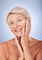 Image showing Sunscreen, portrait and skincare senior woman in studio for beauty, skin healthcare and antiaging wellness. Elderly or old woman model cream product for facial, skin care or dermatology advertising