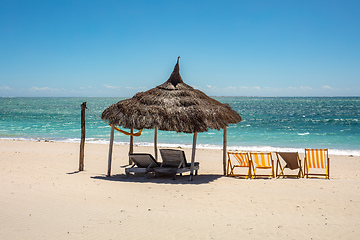 Image showing Anakao beach in Madagascar, with a clear blue sky, a comfortable sun lounger