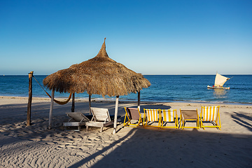 Image showing Anakao beach in Madagascar, with a clear blue sky, a comfortable sun lounger