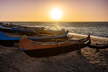 Image showing Empty wooden fishing boat on the shore of Anakao beach, waiting for the next catch of the day in Madagascar