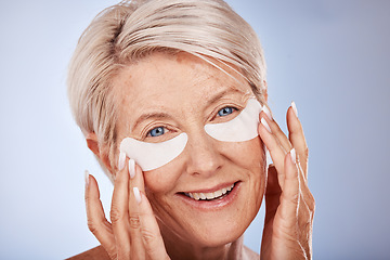 Image showing Senior woman with collagen eyes mask for skincare, dermatology and facial wellness on studio mockup marketing or advertising space. Elderly model portrait and eye patches product for antiaging beauty