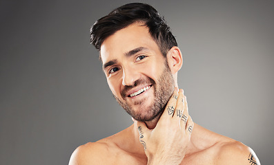 Image showing Wellness, skincare and face of man with smile in studio isolated on gray background. Beauty, cosmetics and confident male model posing for skincare products, body care and grooming for healthy skin