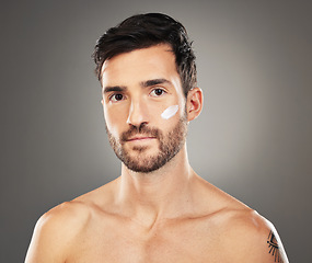 Image showing Face cream, skincare and beauty portrait of man in studio isolated on gray background. Wellness, health and male model from Canada with facial creme, moisturizer or cosmetics product for healthy skin