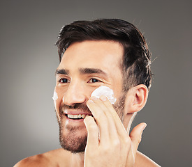 Image showing Skincare cream, face product and man with with dermatology ointment for acne prevention, beauty or self care. Facial cosmetics, healthcare treatment or model moisturizing with lotion for glowing skin