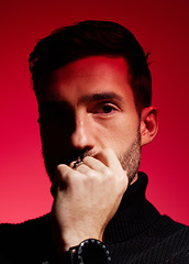 Image showing Face, thinking and red with a man model in studio on a color wall background for idea or contemplation. Fashion, portrait and creative with a handsome young male posing against a red background alone