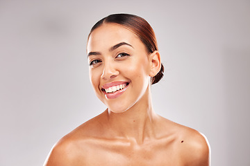 Image showing Skincare, wellness and portrait of latino woman with smile on gray background in studio. Beauty, dermatology and face of confident young model for healthy skin, makeup and cosmetic beauty products