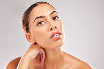 Image showing Black woman, face and makeup portrait for beauty, health and cosmetic skin in studio against grey backdrop. Woman, skincare and shine for model with radiant glow facial against cosmetics background