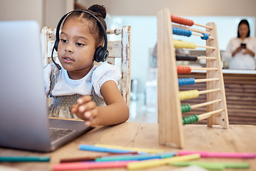 Image showing Girl, laptop and learning in home for education, development or study in home with toys, pen or tech. Child, computer and digital home school with video conference, video call or elearning classroom