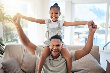 Image showing Happy, shoulders and father with girl on sofa for bonding, playing or support together. Airplane, smile and relax with portrait of dad and child in living room of family home for energy, care or time