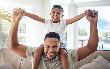 Image showing Portrait, father and son on shoulder, smile and happy being loving, bonding and playful together in lounge. Love, black dad and boy child with happiness, spend quality time and joyful in living room.