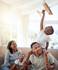 Image showing Happy family playing living room with toy airplane for fun games, freedom and energy together in family home. Parents, kids and flying aeroplane toys to dream for travel, easy lifestyle and happiness