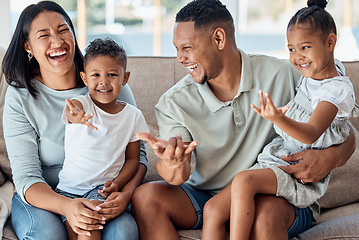 Image showing Happy family, children or laughing and bonding on sofa in house or home living room in fun game, playful activity or superhero hands gesture. Smile, love or comic mother, father or parents with kids