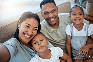 Image showing Happy family, selfie and home portrait of a mother, father and children with a smile. Black family, mom and man together with love, parent care and bonding on a sofa with morning happiness and hug