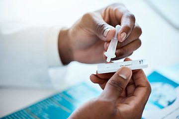 Image showing Hands, covid and doctor with antigen test in hospital for healthcare, wellness and rapid viral testing. Pcr, covid 19 and black male physician with medical kit for examination, diagnosis or results.