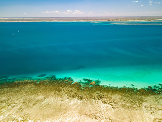 Image showing Bird's eye view of the turquoise waters surrounding the island of Nosy Ve in Madagascar.