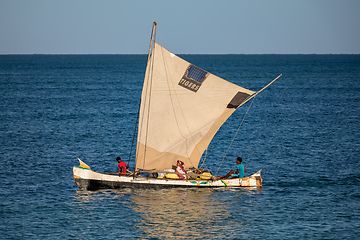 Image showing Fishermen using sailboats to fish off the coast of Nosy Island in Madagascar