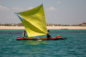 Image showing Fishermen using sailboats to fish off the coast of Nosy Island in Madagascar