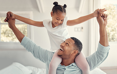 Image showing Dad piggy back girl in family home having fun, quality time and relax together in house. Happy father carrying excited kid on shoulders in bedroom for freedom, happiness and playful weekend to enjoy