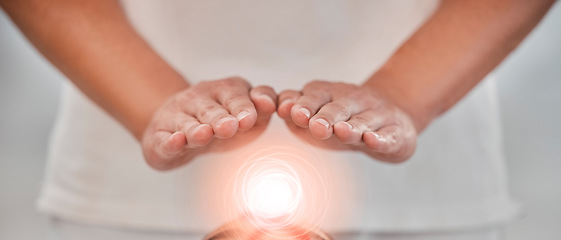 Image showing Hands, light energy and chakra healing for spa healthcare and luxury wellness. Woman palm, reiki therapy and spiritual aura expert or healthy power balance for calm lifestyle with body wellbeing